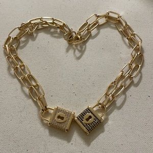 Lot of two paddle lock necklaces